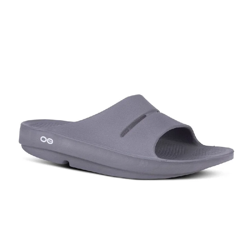 Men's sandals with a perforated leather upper for ventilationOofos OOahh Slide - Slate Men's sandals with a perforated leather upper for ventilationOofos OOahh Slide - Slate