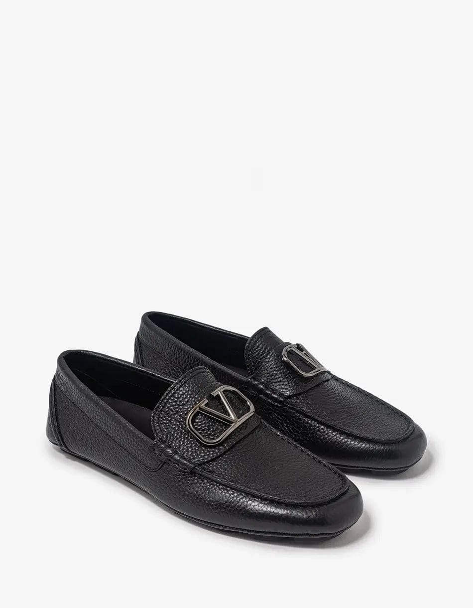 Men's loafers with a decorative buckleValentino Garavani Black VLogo Driving Shoes
