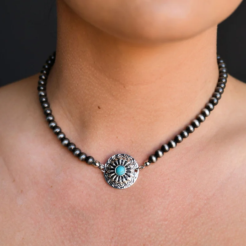 Men's western boots with a tooled leather design on the shaftWest and Co. 14" Navajo Pearl Conch Choker Men's western boots with a tooled leather design on the shaftWest and Co. 14" Navajo Pearl Conch Choker