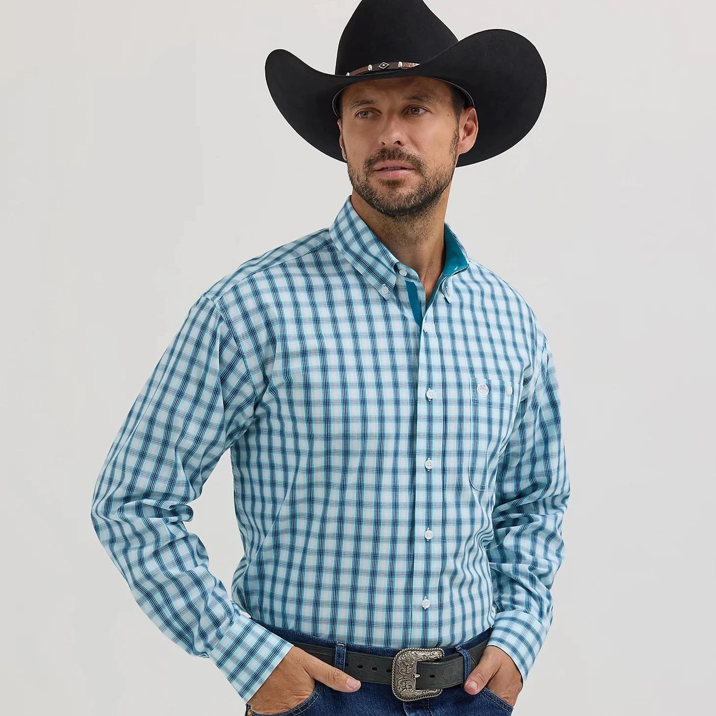Men's western boots with a concho - studded strap and a pointed toeWrangler Men's L/S George Strait Plaid Button Down Shirt in Variance Blue Men's western boots with a concho - studded strap and a pointed toeWrangler Men's L/S George Strait Plaid Button Down Shirt in Variance Blue